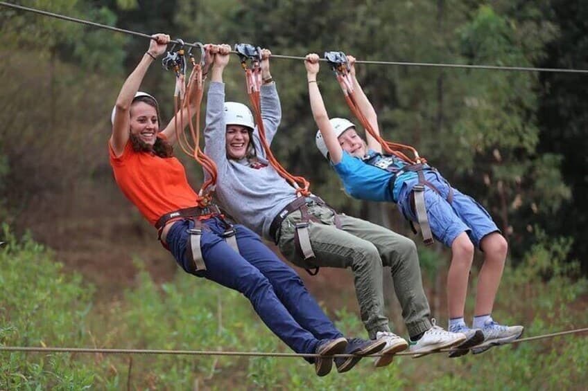 Interior of a building with columns and flags