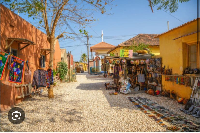 Interior of a building with columns and flags