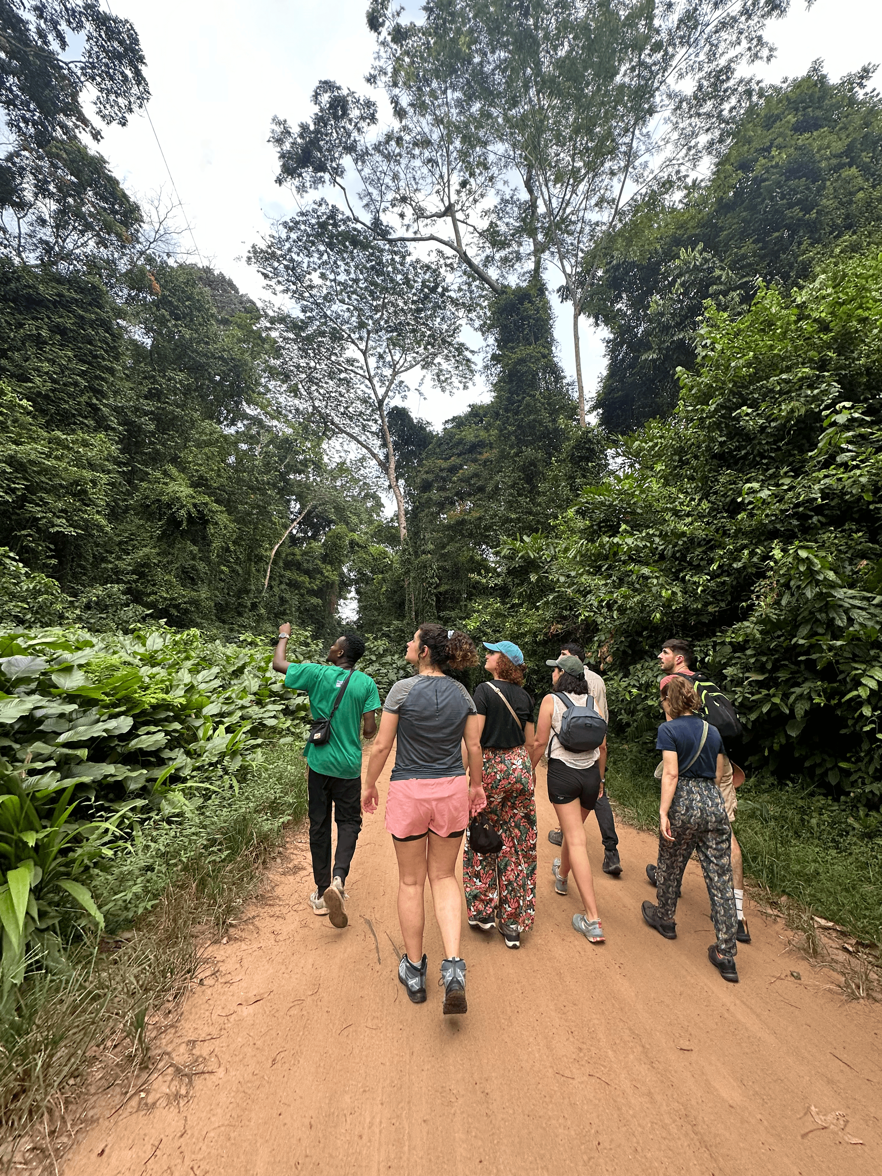 Interior of a building with columns and flags